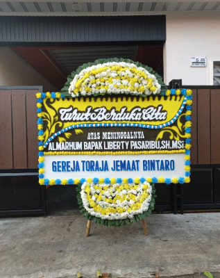 Papan Bunga Duka di Dwi Kora